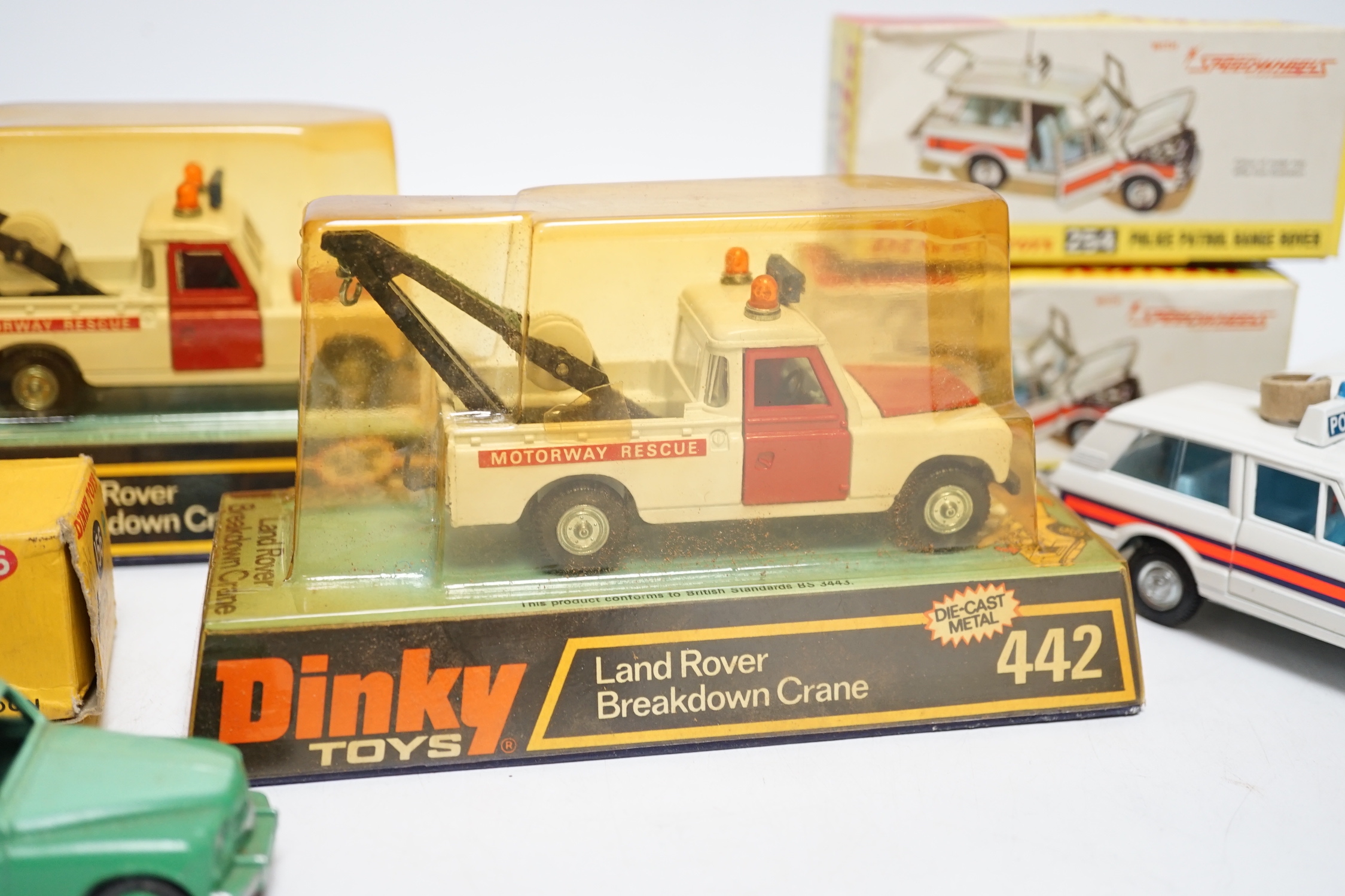 Five boxed Dinky Toys; Rover 75 Saloon (156) in correct two-tone green colour spot box, two Police Patrol Range Rover (254) and two Land Rover Breakdown Crane (442)